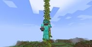 Climbing up using cave vines (Image via Minecraft)